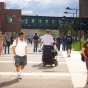 Students walking and traveling by wheelchair on the North Campus. 