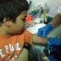 Blood tests with Children in the SAM research project. 