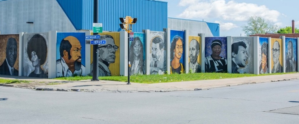 The Freedom Wall, on the corner of Michigan Avenue and East Ferry Street, with images of famous Black leaders. 