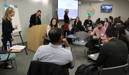 Faculty Discuss with students during small group session of the IP Forum. 