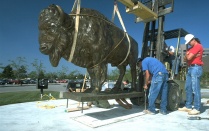 Zoom image: A crew works to install the statue in its permanent location. Photo courtesy of University Archives 