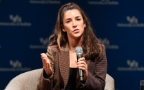 Zoom image: Gold Medal-Winning Gymnast, Aly Raisman, speaking at the Center for the Arts on Nov. 16, 2021. 