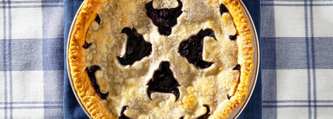 Blueberry pie with UB sprit mark on the crust. 