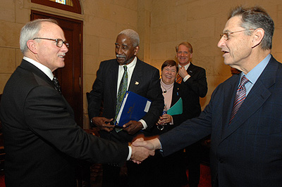 President Simpson
greeting a contingent of UB supporters, volunteers and administrators