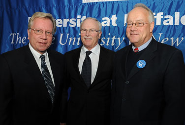 UB President John B. Simpson thanks Assemblyman Robin Schimminger, left, and Sen. William T. Stachowski, right.