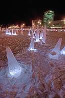 In the installation “Ice Fracture,” ice cones light up as passersby trigger motion sensors. Photo: ©2009 Hal Gage, 
freezeproject.org.