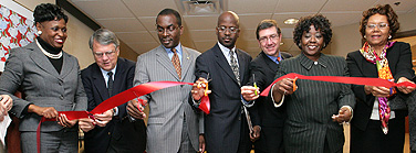 Cutting the ribbon to officially open the clinic are, from left, Jennifer L. Parker, Black Capital Network; UB dental dean Richard Buchanan; Buffalo Mayor Bryon Brown; Larry Cook, John R. Oishei Foundation; James R. Kaskie, chief executive officer, Kaleida Health; New York State assemblywoman Crystal Peoples; and June W. Hoeflich, president and CEO, Sheehan Health Network. Photo: WOMEN AND CHILDREN’S HOSPITAL