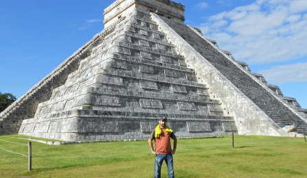 Photo of graduate student with Maya pyramid. 