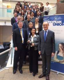 Zoom image: Jean Monnet Chair Deborah Reed-Danahay (second row, center) attends Jean Monnet networking event in Washington D.C. Jan 28-29, 2016. Photo of group with EU Ambassador to the United States David O'Sullivan. 