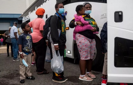 People waiting to board a bus to evacuate Lake Charles, Louisiana, where Hurricane Laura was expected to hit. ANDREW CABALLERO-REYNOLDS/AFP via Getty Images. 