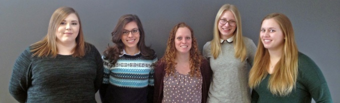Pictured above, from left to right, Megan Johnson, Tara Hudson, Alyson Bittner, Ellyn Sanger, and Kelly Dougan gather after an AWM meeting. 