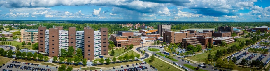 Exterior aerial image of North Campus taken in August 2025. Hochstetter and Cooke Halls at left, with the Promenade and Spine. Photographer: Douglas Levere.