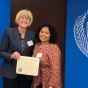 Zoom image: Pictured at the 2022 awards ceremony, UB College of Arts and Sciences Dean Robin G. Schulze (left) and Linda Alegria (right) UB Mathematics Graduate Student. 
