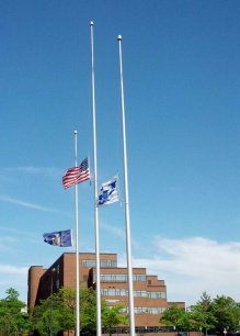 In Memoriam flags at half-staff next to Park Hall, North Campus, University at Buffalo. 