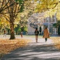 fall season with students walking on campus. 