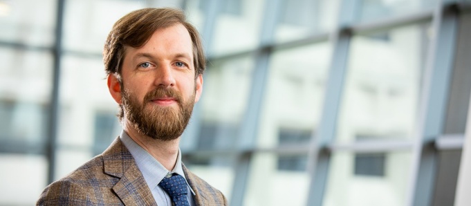 Ryan Muldoon, associate professor of philosophy. Photo: Douglas Levere. 