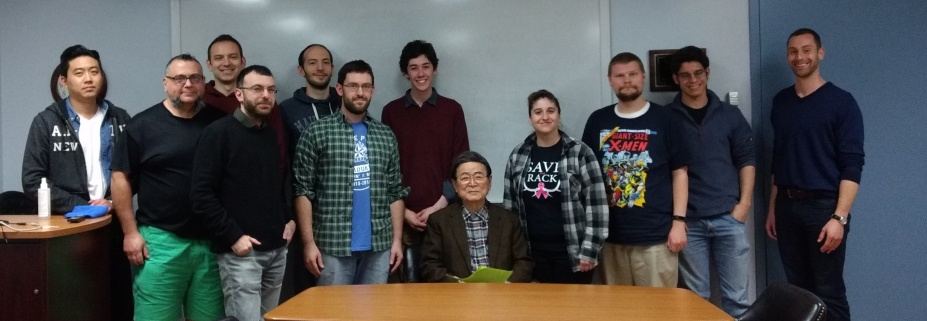 Zoom image: Professor Kah Kyung Cho (seated) with UB Philosophy students in 2019; further details forthcoming. Photograph courtesy Angela Menditto. 