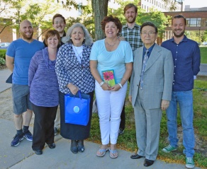 Zoom image: At the UB Philosophy Department's Fall 2015 Welcome Reception and Award Presentation, standing left to right, John C. Beverley, Patricia Hahn, Brian Donahue, Theresa Monacelli, Elizabeth Felmet, Professor Ryan Muldoon, Professor Kah Kyung Cho, and Rasmus Rosenberg Larsen. 