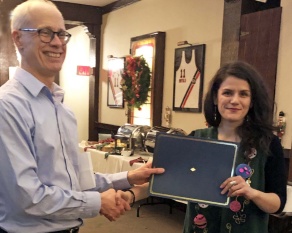 Zoom image: Dr. David Braun (left) presents the 2018 Peter Hare Award for Best Overall Paper to Ariane Nomikos for her essay, &ldquo;Place Matters.&rdquo; 
