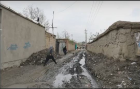 A narrow Kabul residential street choked with mud.