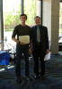 Matthew Casa, left, receives the Lucia Maria Houpt Award for academic excellence demonstrated by a graduating senior.