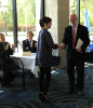 Rosaleen McAfee, left, receives the second place award for her submission to the student poster competition.