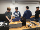 Team members working on design during a weekly meeting in Bell Hall. From left are Joshua Duell, Kevin Zheng, Ryan Hughes and Imon Tatar.