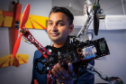 Engineering researcher Rahul Rai with an unmanned aerial vehicle. Photo by Douglas Levere