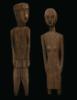 Artists Once Known (Jarai, Vietnam), Funerary Figures, c. 19th century. Wood, 8 x 8 x 38 1/4 inches (left); 9 1/2 x 9 1/2 x 38 3/4 inches (right). University at Buffalo Art Galleries: Gift of Annette Cravens. 