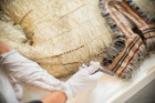 Jungels brings her expertise to the conservation of many of the Peabody Museum’s million-plus objects, including this native Alaskan gutskin parka.