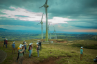 Students tour the turbines at the wind farm.