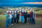 John D. Atkinson (far right, back row) and students in his Costa Rica: Sustainability in Latin America course pose for a picture at the Guanacaste Wind Farm in Costa Rica.