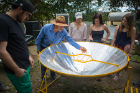 A guide explains the process of solar cooking.
