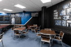 UB Athletics’ Bull Pen Club redesign includes full-wrap wall graphics featuring UB Athletics photography and branded marks.