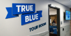 True Blue branded wall graphics.