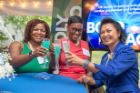 Rochelle Fields and Ebony Miller-Wesley share a toast with Cynthia Khoo-Robinson.