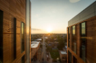 The view over Allen street as the sunsets from a window in the Jacobs School of Medicine and Biomedical Sciences building. 