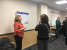 Professor Natalie Simpson from the School of Management in discussion with Cheryl Oyer at the March 2018 Poster Session event.