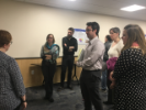 Erica Goddard, Psychology College of Arts and Sciences, having discussions during March 2018 Poster Session event.