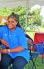 Alumna assists with sign-in at Buffalo Juneteenth Festival