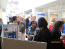 Visitors to the EOC booth at the 2011 Albany Caucus 
