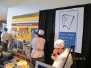 A food demonstration at the Niagara Falls Culinary Institute booth at the 2011 Albany Caucus 