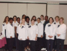 Newly-pinned dental assisting students and faculty pose for a group photo
