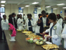 Attendees help themselves to the snack buffet