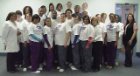 Dental Assisting School Students and Faculty pose outside a classroom 2011