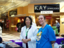 Two Dental Assisting school volunteers at a mall