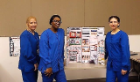 Dental Assisting school students standing around project