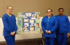 Dental Assisting school students standing around project