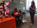 Registered Medical Assistant student providing blood pressure screening