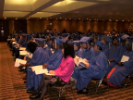 Graduates wait to receive their degrees 